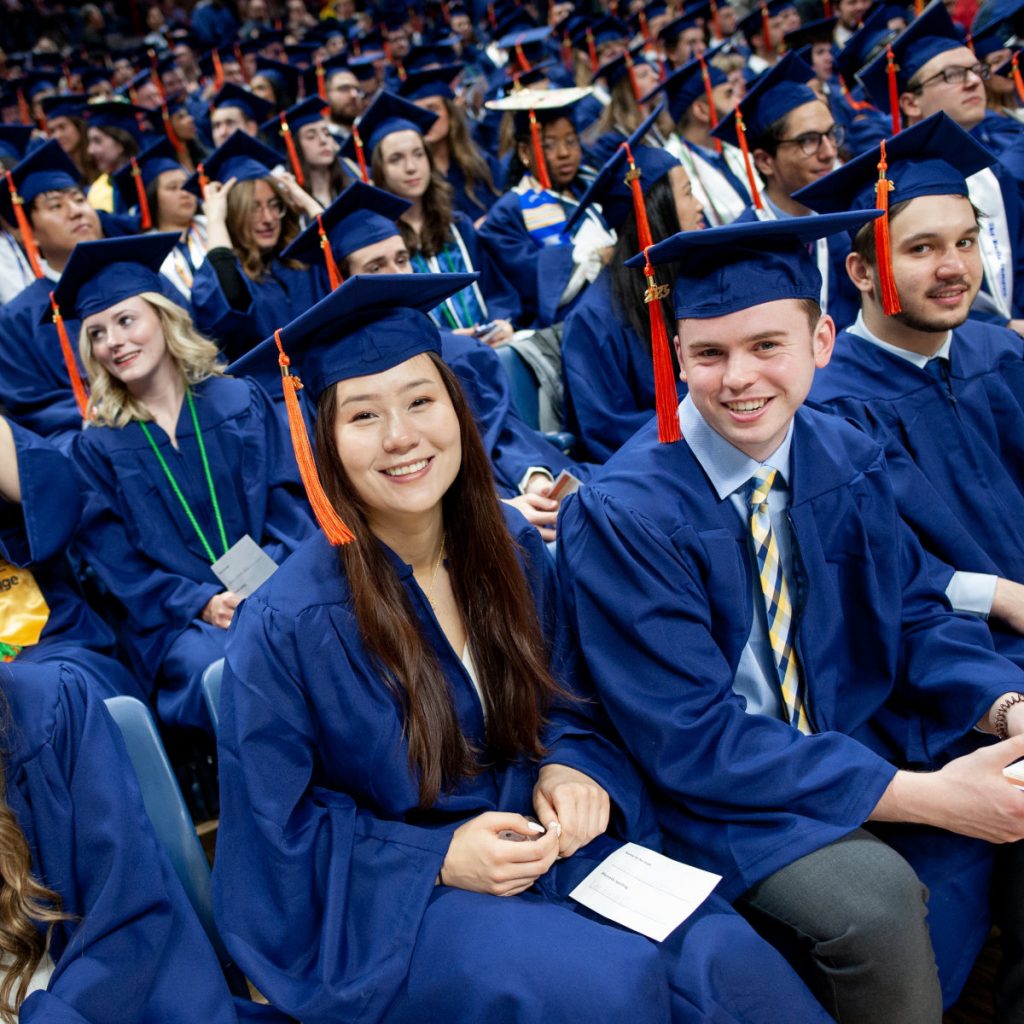 students in commencement regalia
